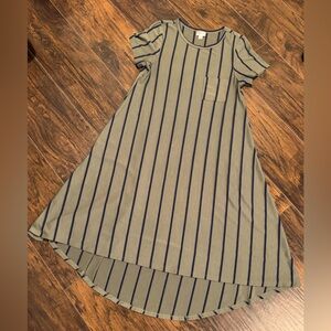 Like new. Carly style dress. Short sleeve. Longer in front , shorter in back.